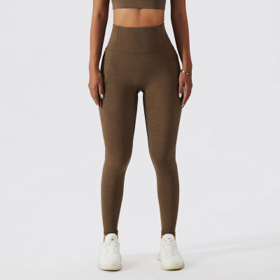 Quick drying yoga pants Women's pocket Butt Lift outdoor running fitness pants Elastic high waist Tight Fitting pants