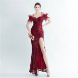 Positioning sequin feather straps off shoulder formal party evening dress