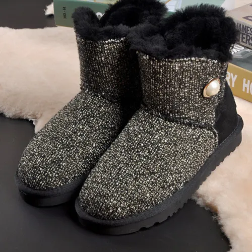 Wholesale of low cut short tube sheepskin fur integrated snow boots by manufacturers, women's buttons, pearl buttons, cotton boots, large size