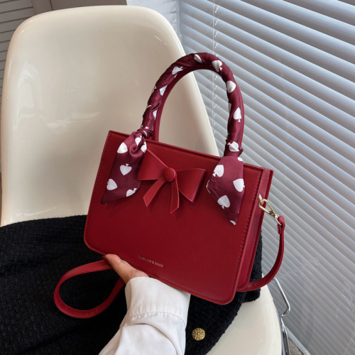 Women's New Forest Women's Polka Dotted Ribbon Bowtie Western style Instagram Large Capacity Handheld Crossbody Tote Bag