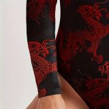 Cross border European and American women's round neck long sleeved fashionable and sexy dragon print tight and spicy girl style jumpsuit top