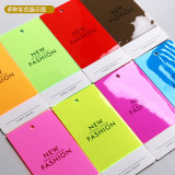 Colored soft rubber hang tags are made for women's clothing in clothing stores. Logo and hang card design are trendy, and clothing trademarks are available for hanging in stock