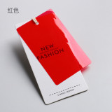 Colored soft rubber hang tags are made for women's clothing in clothing stores. Logo and hang card design are trendy, and clothing trademarks are available for hanging in stock