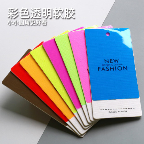Colored soft rubber hang tags are made for women's clothing in clothing stores. Logo and hang card design are trendy, and clothing trademarks are available for hanging in stock
