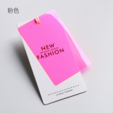Colored soft rubber hang tags are made for women's clothing in clothing stores. Logo and hang card design are trendy, and clothing trademarks are available for hanging in stock