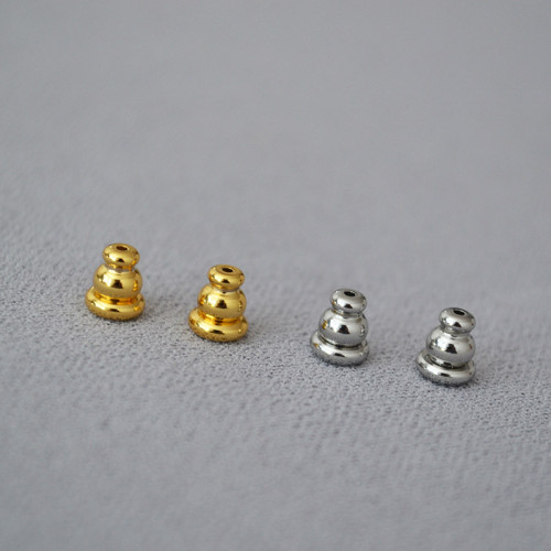 Wholesale of brass plated with genuine gold, anti slip silicone bullet head, gourd ear plug, earplug accessories, DIY