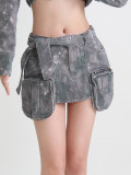 Design inspired printed camouflage short skirt, spring new high waisted lace up three-dimensional pocket zipper A-line skirt