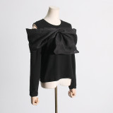 Spring new patchwork bow design with a sense of niche, black long sleeved T-shirt, women's careful machine off shoulder top