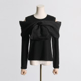Spring new patchwork bow design with a sense of niche, black long sleeved T-shirt, women's careful machine off shoulder top