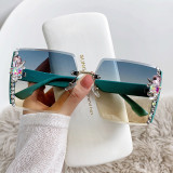Fashion trendy sunglasses high-end diamond sunglasses square frameless UV resistant sunglasses with side diamond highlights