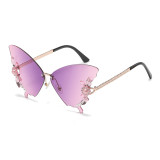 New butterfly shaped diamond inlaid frameless sunglasses for women, fashionable and personalized, exaggerated sunglasses for women with round faces and large faces