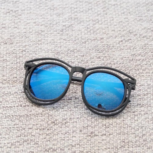 Korean version children's arrow reflective sunglasses trendy products for boys and girls, hollowed out transparent round frame children's sunglasses in stock 3167