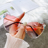 Cross border New Cat Eye Sunglasses for Women with Borderless and Diamond Inlaid Sunglasses, Popular on the Internet for Women, Same Style for Slimming and UV Protection