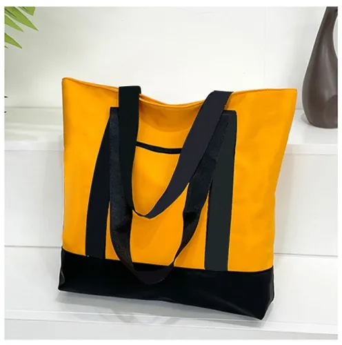 Wholesale canvas bags for women with large capacity for work and commuting, simple laptop bags for leisure shopping, single shoulder tote bags