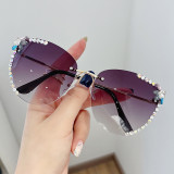 Cross border New Cat Eye Sunglasses for Women with Borderless and Diamond Inlaid Sunglasses, Popular on the Internet for Women, Same Style for Slimming and UV Protection