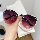 Cross border New Cat Eye Sunglasses for Women with Borderless and Diamond Inlaid Sunglasses, Popular on the Internet for Women, Same Style for Slimming and UV Protection