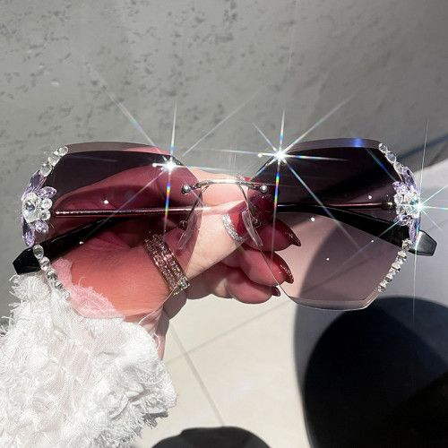 Cross border new product frameless glasses for women in South Korea, trendy UV resistant sunglasses for women with bare skin, divine tool for showing face, small sunglasses