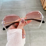 Cross border new sunglasses with diamond inlay and sunglasses for women with a high-end feel, Instagram for small face, frameless, UV resistant sunglasses