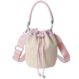 Cross border Grass Woven Bucket Bag for Women's Autumn Fashion Drawstring Handheld Shoulder Bag with Western Style and Personalized Crossbody Bag Bags
