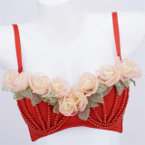 Eugenia floral suspender worn on stage, beautiful back, fishbone bra, pure desire, colorful floral top for women