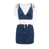 Cross border European and American style summer new sexy suspender with backless spicy girl top, high waisted and buttocks wrapped denim skirt set for women