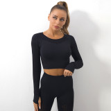 Hot selling seamless knitted hollow sexy moisture wicking long sleeved yoga suit from Europe and America, sports fitness running