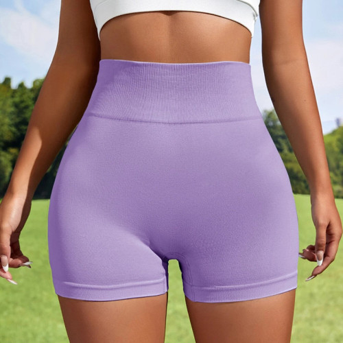 Seamless knitted yoga shorts from Europe and America, peach lifting buttocks, high waist fitness pants, tight fitting running sports, three part women's shorts