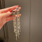 6 # Silver Needle - Golden Pearl Crystal Tassel