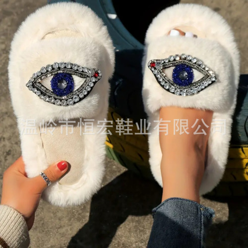 Autumn and winter new women's rhinestones with big eyes, embroidered fur slippers, and a feeling of stepping on feces. Home slippers with a straight line can be worn externally