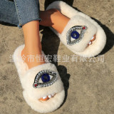 Autumn and winter new women's rhinestones with big eyes, embroidered fur slippers, and a feeling of stepping on feces. Home slippers with a straight line can be worn externally