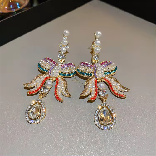 Women's rhinestone pearl tassel 925 silver needle earrings French court style long bow pendant earrings