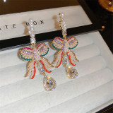 Women's rhinestone pearl tassel 925 silver needle earrings French court style long bow pendant earrings