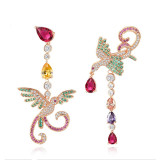 Wholesale of European and American fashion ethnic style long phoenix S925 sterling silver needle earrings, colored zircon earrings, and earrings