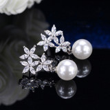 Taobao's supply of fashionable high-end and atmospheric hot selling Korean version flower zircon pearl earrings, earrings wholesale