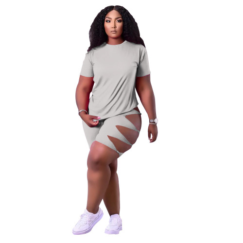 Women's summer short sleeved hollow twisted shorts sports set, solid color elastic two-piece set for women