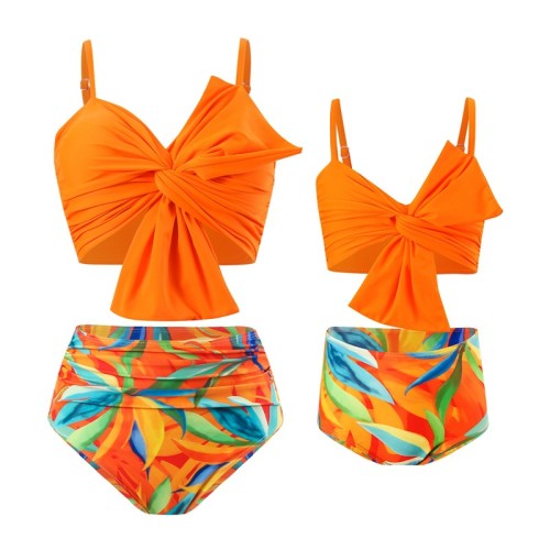 Wholesale of swimsuits, solid color large bow bikini huludao printed swimwear, parent-child split swimwear