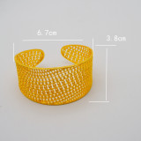 Gold plated zinc alloy large bracelet with hollow carving