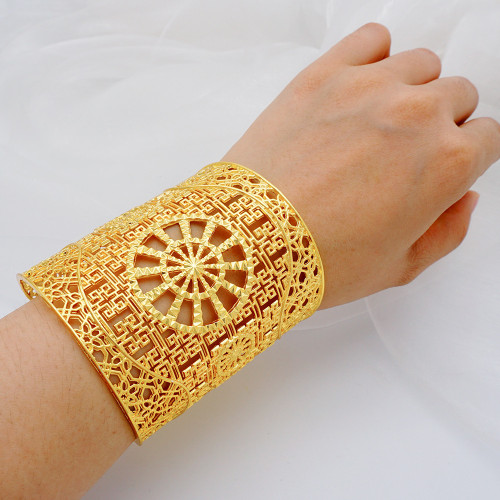Gold plated zinc alloy large bracelet with hollow carving