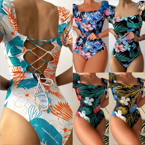 Women's swimsuit with floral triangle print and bikini strap