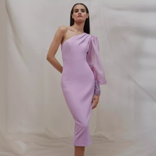 Sexy waistband slimming one shoulder strapless long dress with a tight fitting solid color and buttocks wrapped dress