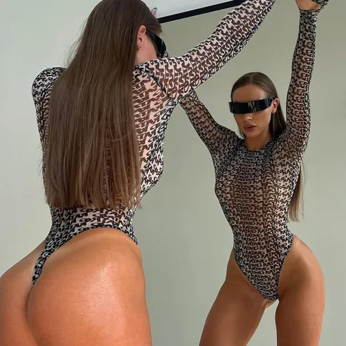 Sexy long sleeved tight fitting top with printed mesh jumpsuit