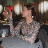 Sexy long sleeved tight fitting top with printed mesh jumpsuit