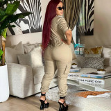 Multi bag workwear cardigan, waist cinching jumpsuit, and jumpsuit pants