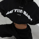 Two piece set of letter printed sweatshirt with loose pockets and sweatpants