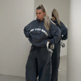 Two piece set of letter printed sweatshirt with loose pockets and sweatpants