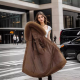 Cotton jacket, medium to long, with a large fur collar and plush lining to overcome the challenge of outerwear