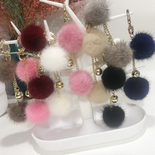 Mink fur ball smiley face ornament