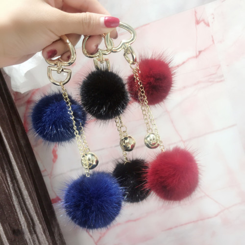 Mink fur ball smiley face ornament