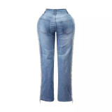 Straight leg jeans with tassel design