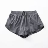 Wholesale Women Sports Biker Shorts Solid Soft Double Layer Skin Friendly Quick Drying Running Fitness Yoga Shorts With Pocket